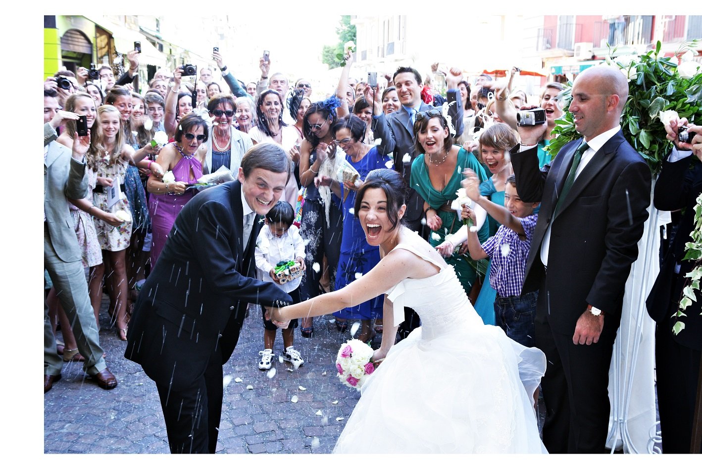 George and Mariacristina being showered with confetti