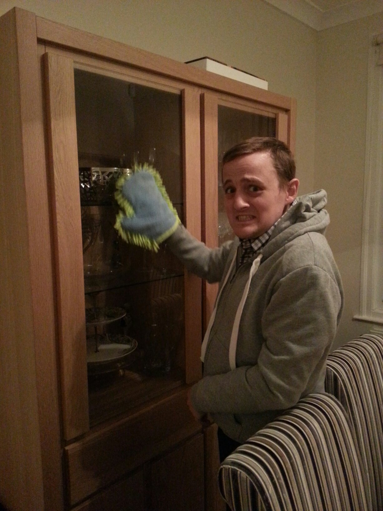 George reluctantly dusting