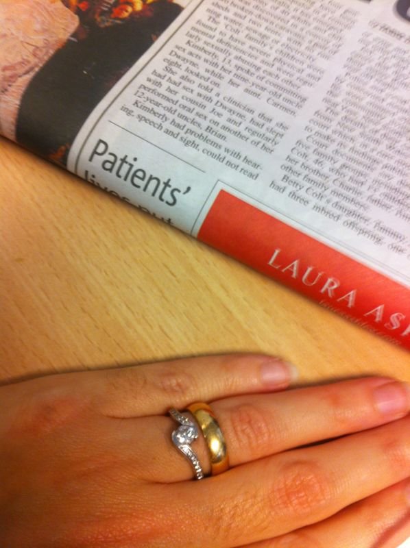 Mariacristina's ring finger with engagement and wedding ring