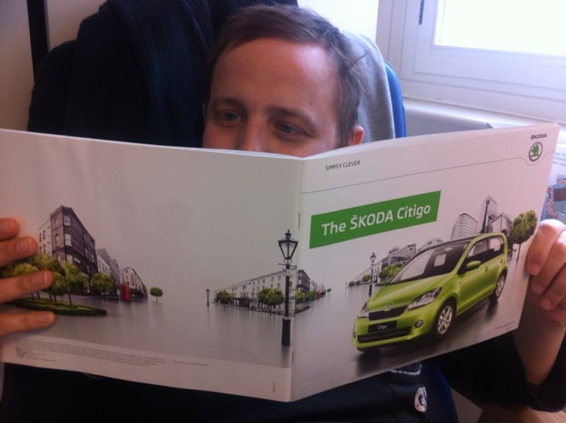 George reading a Skoda Citigo brochure