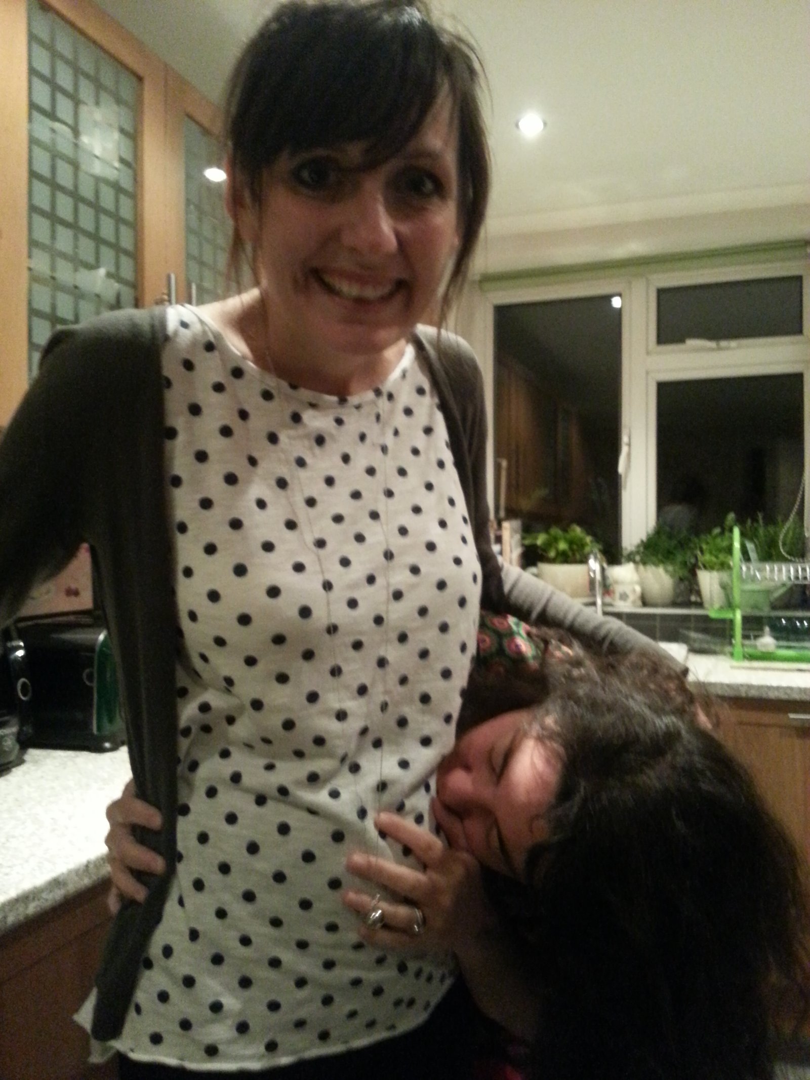 Mariacristina embracing Jagoda's tummy