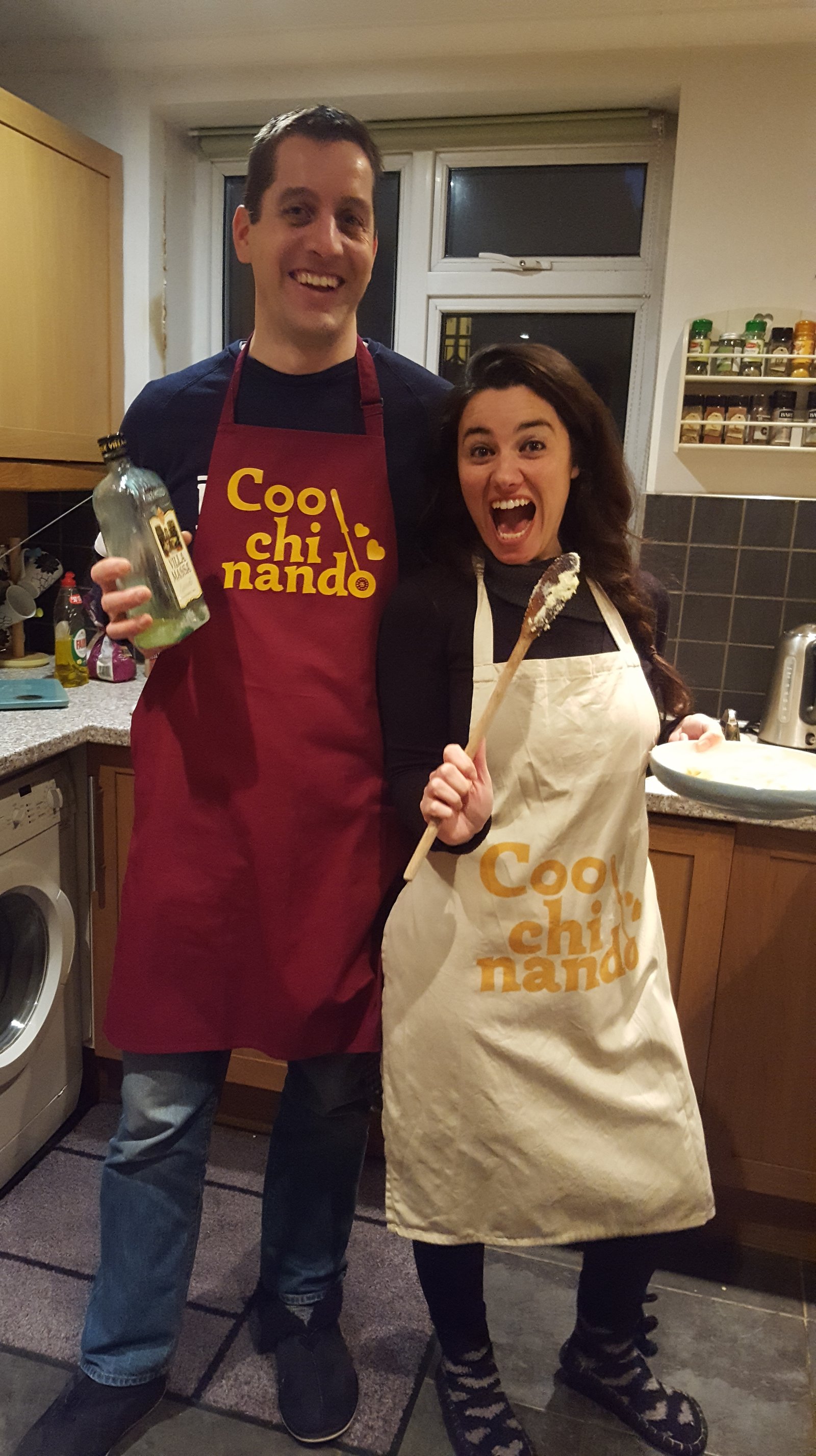 Geoff and Mariacristina in the kitchen with cooking tools