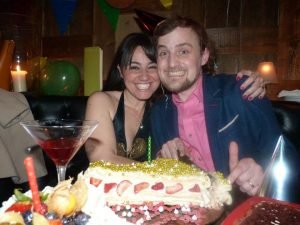 George and Mariacristina with '1' cake