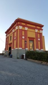 Red and yellow building of the Rione Terra